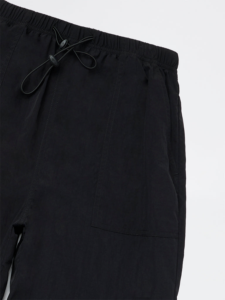 Y&F Kids Girls Black Solid Mid-Rise Trousers