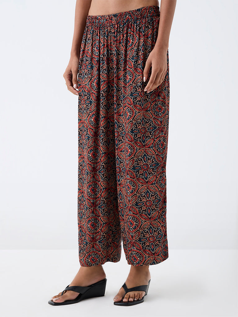 Utsa Red Floral Printed Pants