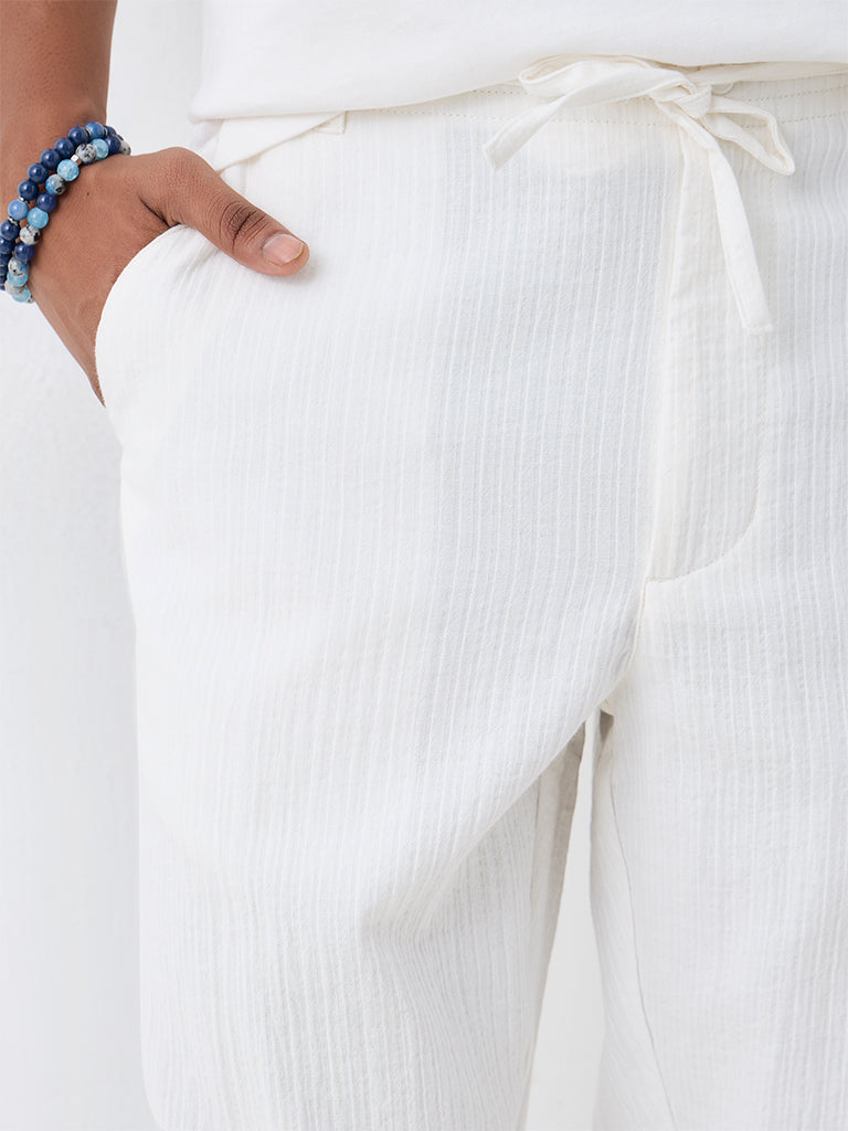 ETA Off-White Self-Striped Relaxed-Fit Mid-Rise Cotton Chinos