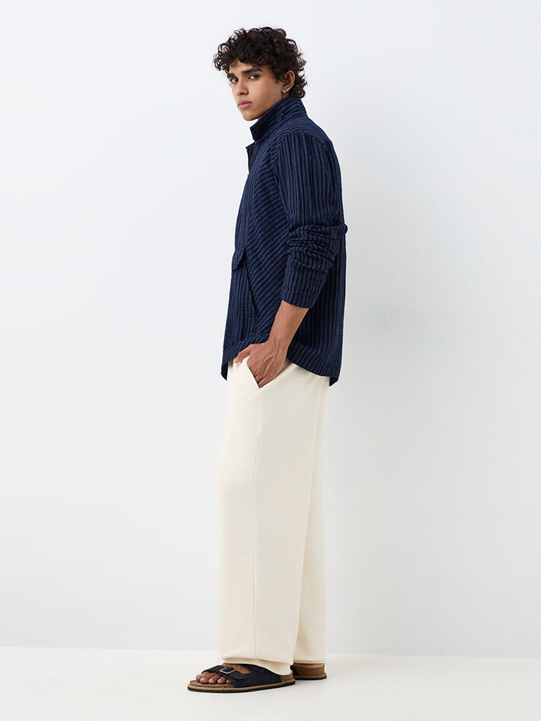 ETA Off-White Textured Relaxed-Fit Mid-Rise Cotton-Blend Chinos
