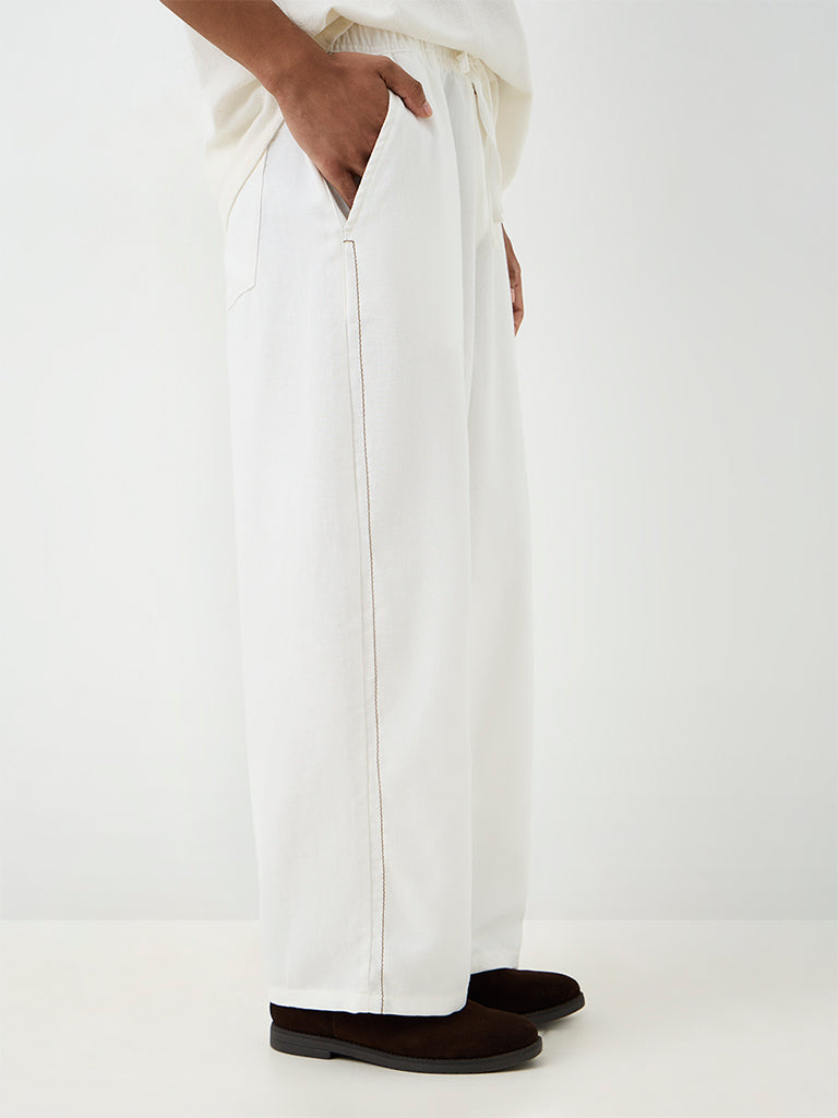 ETA Off-White Striped Relaxed-Fit Mid-Rise Cotton-Blend Chinos