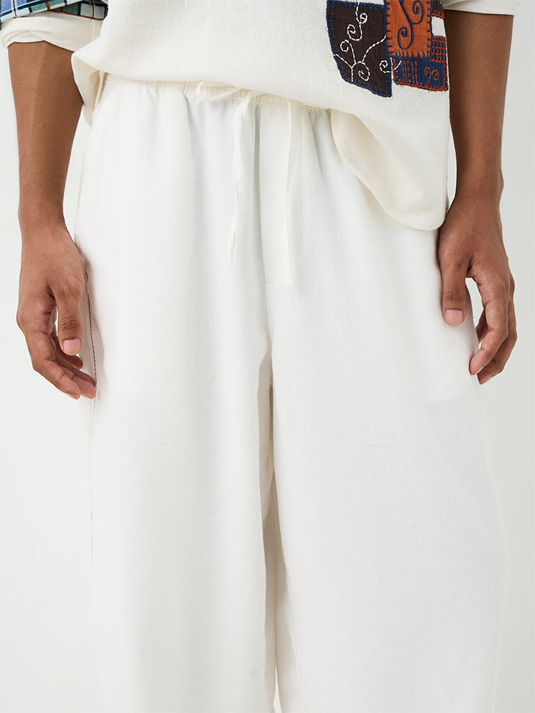 ETA Off-White Striped Relaxed-Fit Mid-Rise Cotton-Blend Chinos